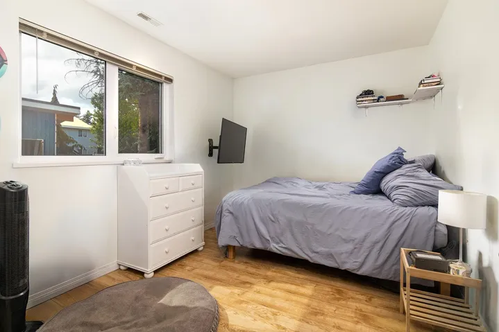 Bedroom with light wood-type flooring