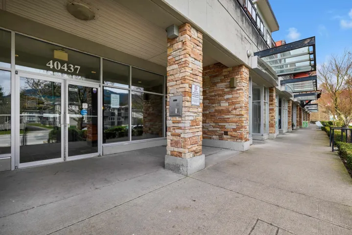 View of exterior entry featuring stone siding