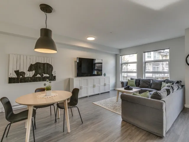 Living room featuring wood finished floors and baseboards