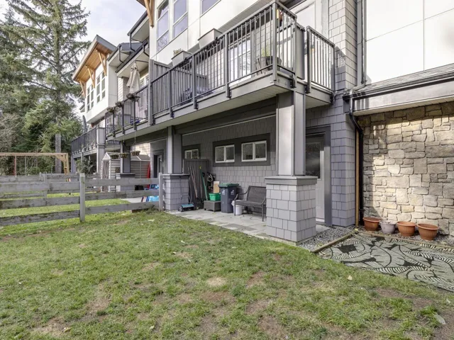 Rear view of house featuring a balcony
