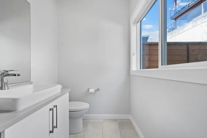 Bathroom featuring vanity and tile patterned flooring
