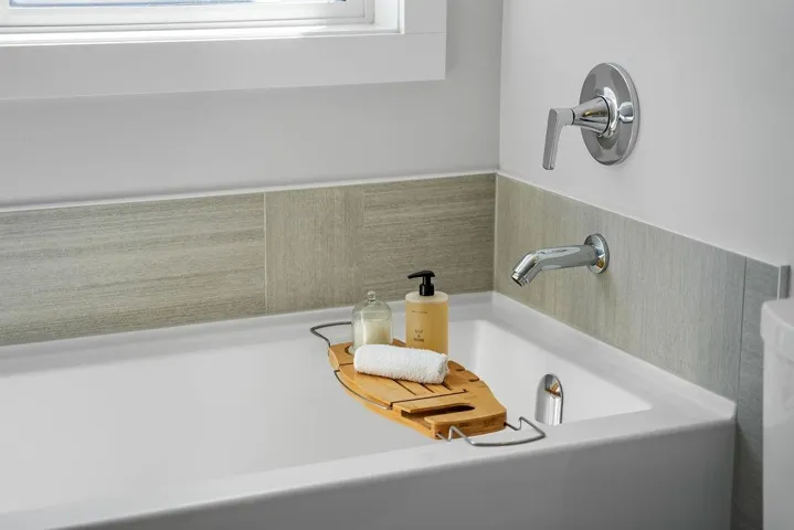 Full bathroom with a garden tub