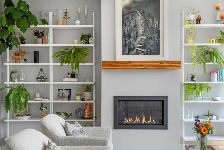 Sitting room with a glass covered fireplace