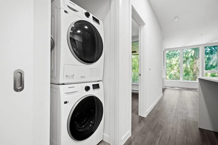 Dedicated laundry closet with stacked washer and dryer