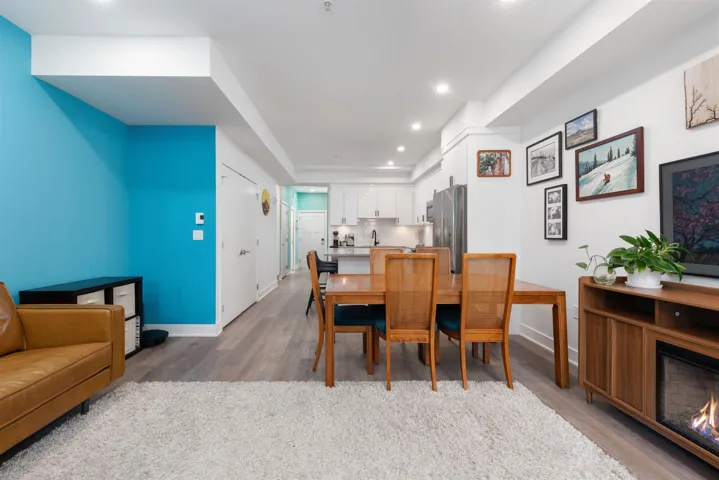 Dining space featuring light wood finished floors and recessed lighting