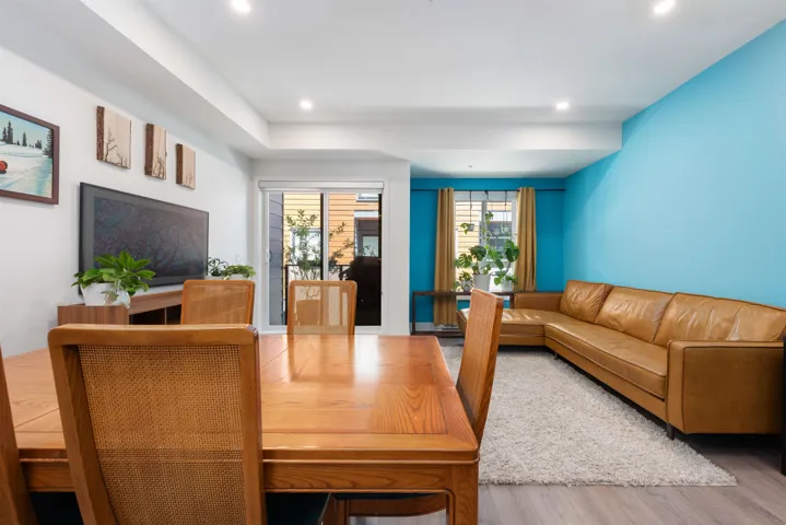 Dining area featuring wood finished floors and recessed lighting