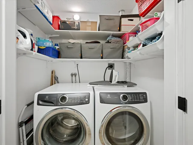 Laundry room with separate washer and dryer