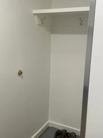 Laundry room featuring baseboards