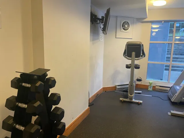 Workout room with baseboard heating