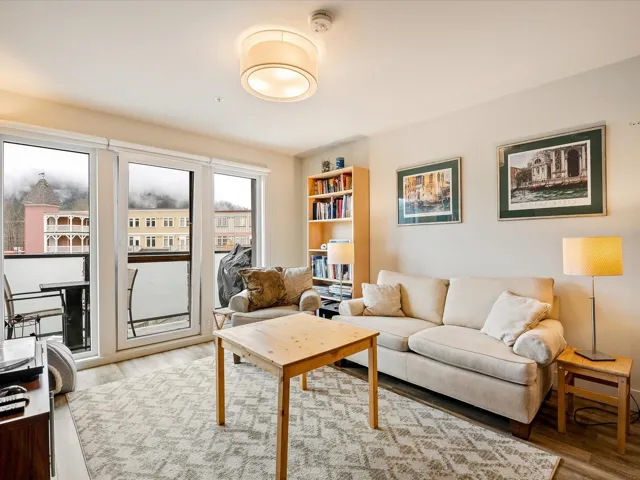 Living room with light wood-style floors