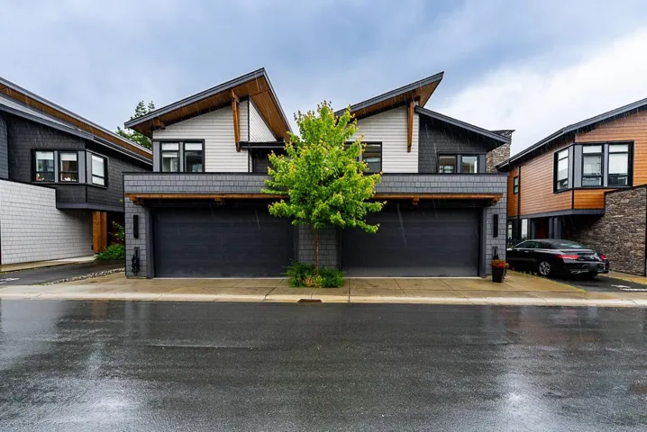 Contemporary home featuring an attached garage