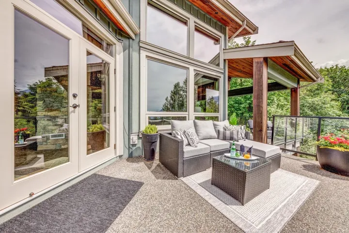 Expansive outdoor living area featuring a durable aggregate surface