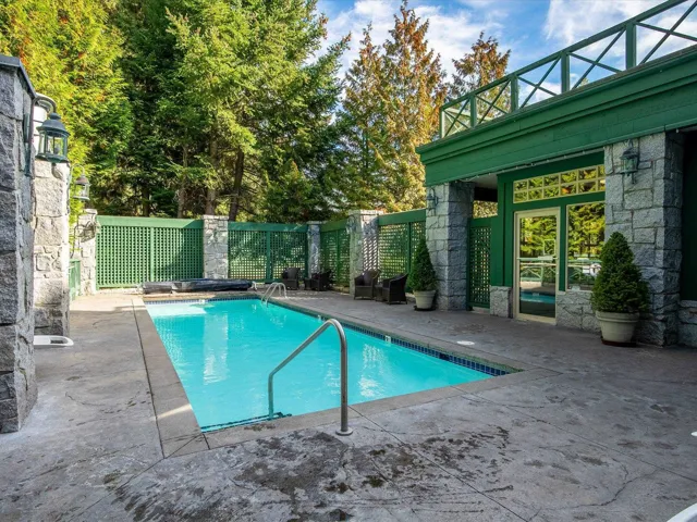 View of pool with a patio area and a fenced backyard