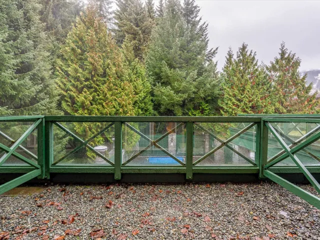 Gate featuring a balcony