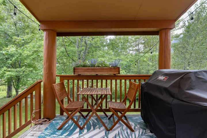 Wooden terrace with a grill