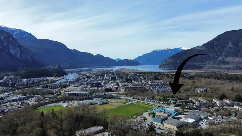Mountain view featuring a water view