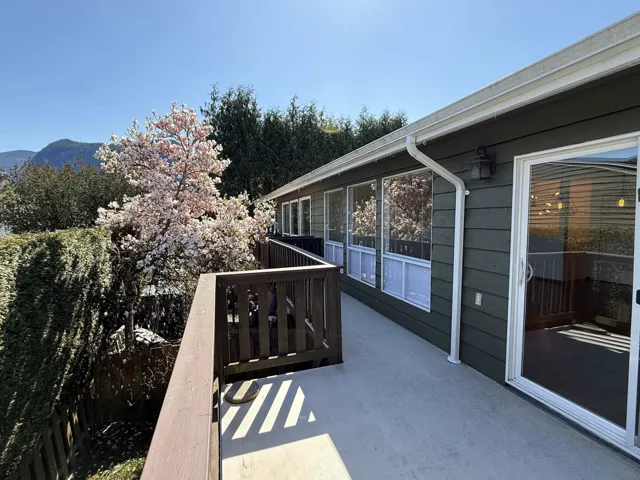 Exterior space featuring a mountain view and fence