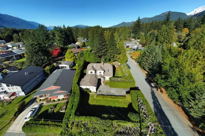 Aerial view of residential area featuring a mountain backdrop