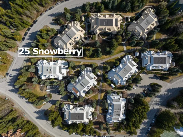 Aerial overview of property's location featuring nearby suburban area