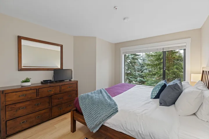 Bedroom with light wood-style floors