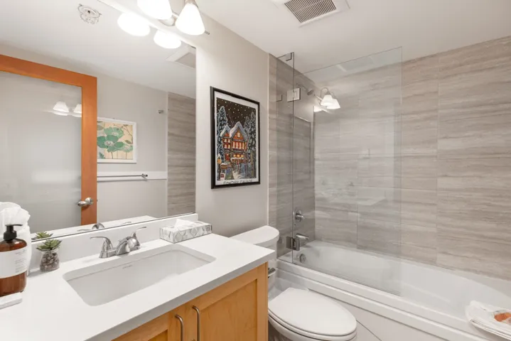 Bathroom with tub / shower combination and vanity