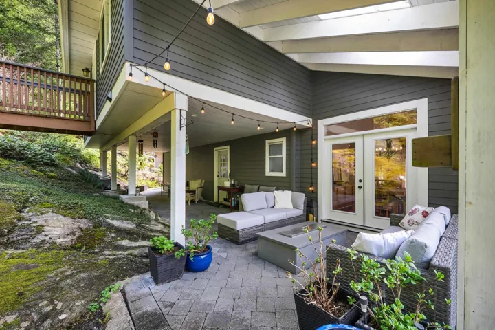 View of patio with french doors and outdoor furniture