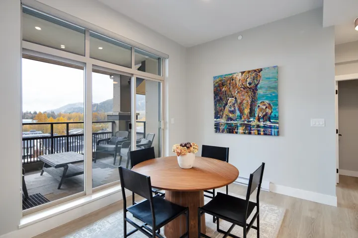 Dining room featuring baseboards and light wood-style flooring