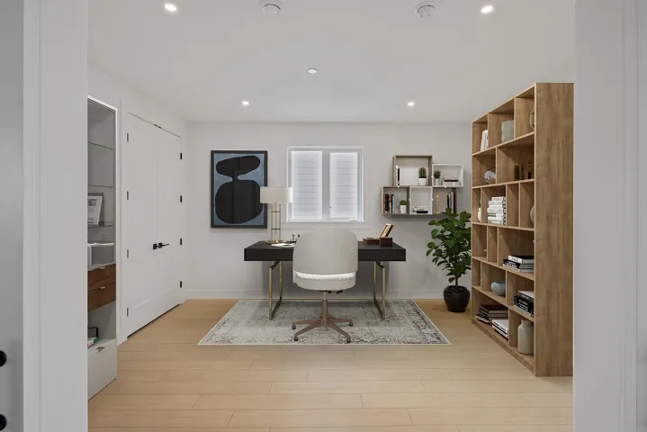 Office featuring light wood finished floors and recessed lighting