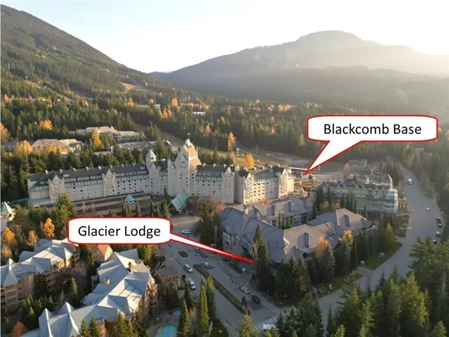 Aerial view of property's location featuring mountains