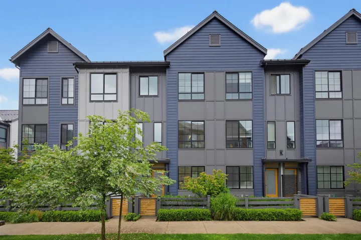 Modern townhome exterior showcasing a multi-level design