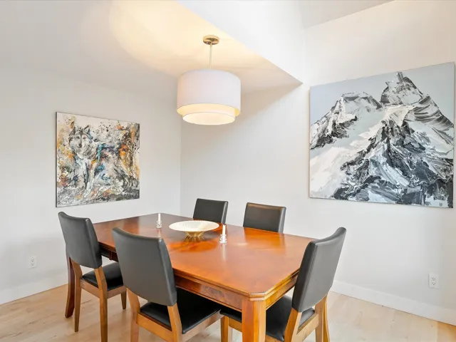 Dining room with baseboards and light wood-style floors