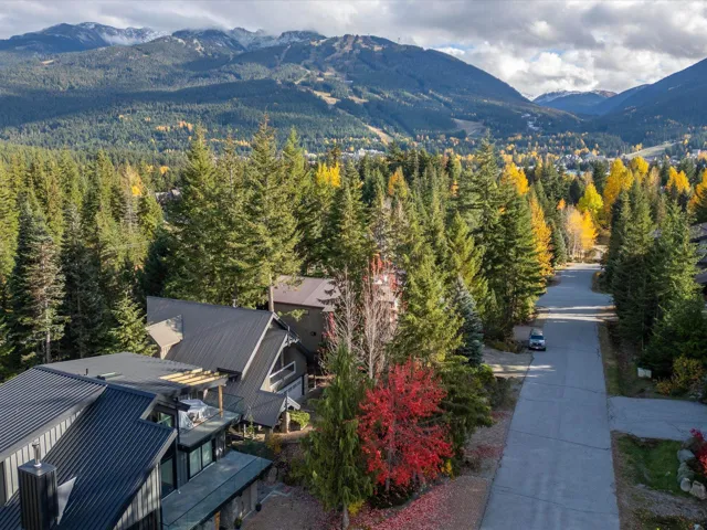 Property view of mountains featuring a forest view