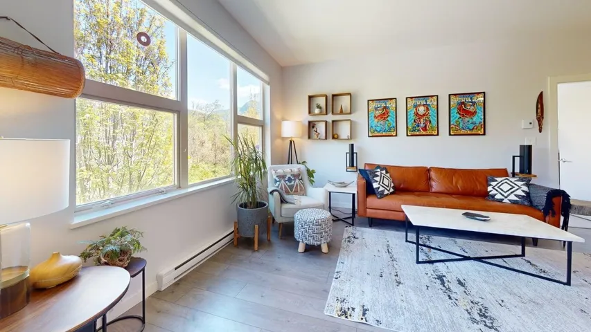 Living room featuring wood finished floors