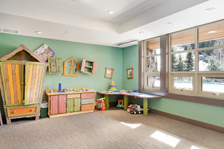 Playroom with carpet floors, visible vents, and recessed lighting