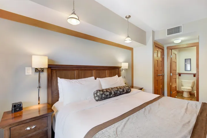 Bedroom with visible vents and ensuite bathroom