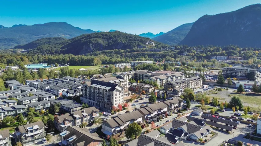 Birds eye view of property with a mountain view