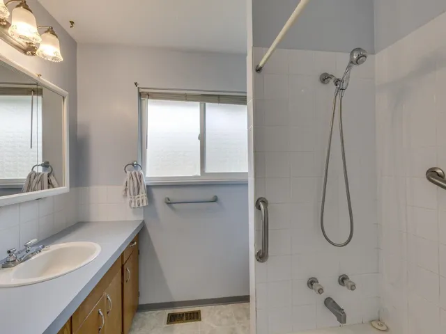 Full bathroom featuring  shower combination and vanity