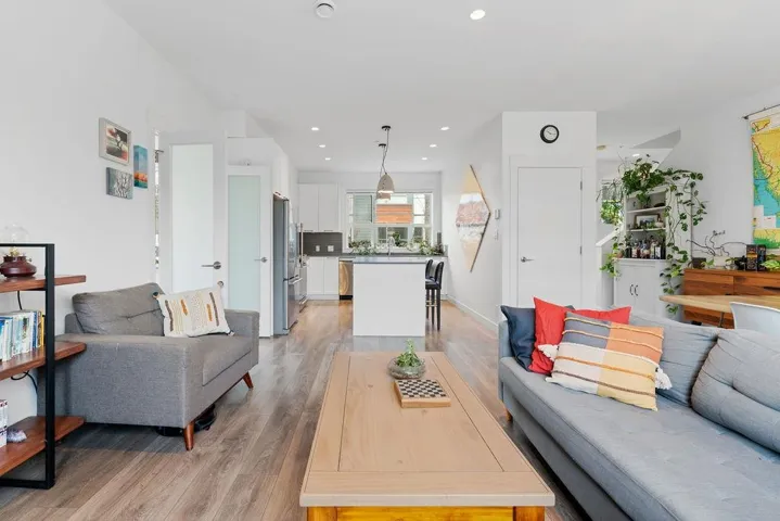 Living room featuring recessed lighting and light wood-type flooring