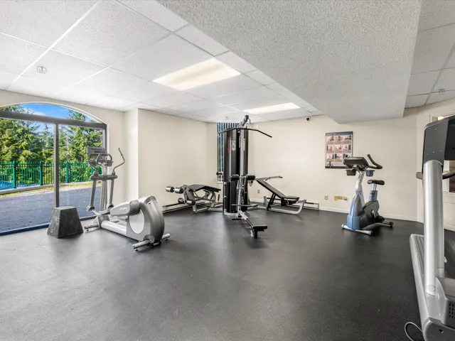 Exercise room featuring a paneled ceiling