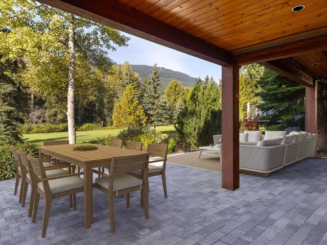 View of patio / terrace with outdoor dining area, a mountain view, and an outdoor hangout area