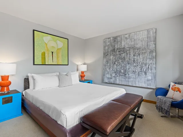 Carpeted bedroom with baseboards