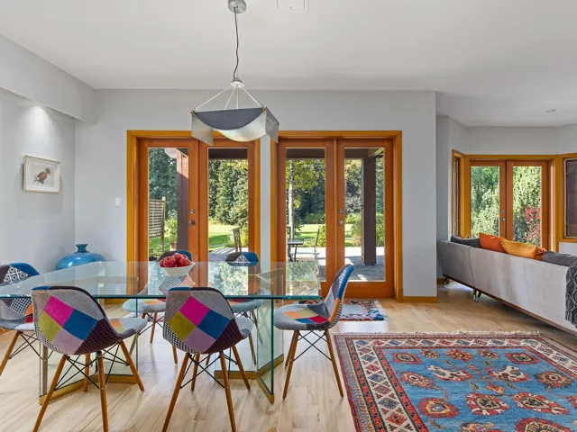 Dining space featuring french doors and wood finished floors