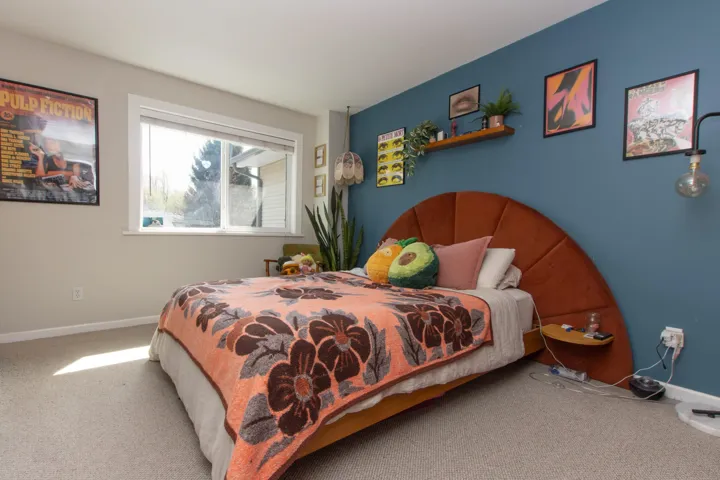 Bedroom with carpet floors and baseboards