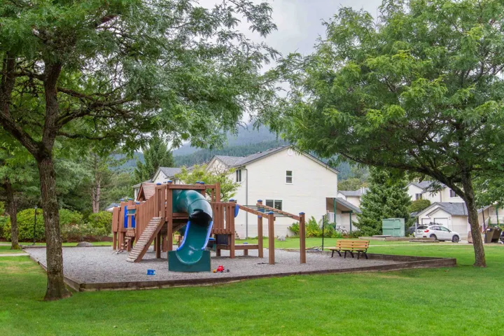 Community play area featuring a lawn