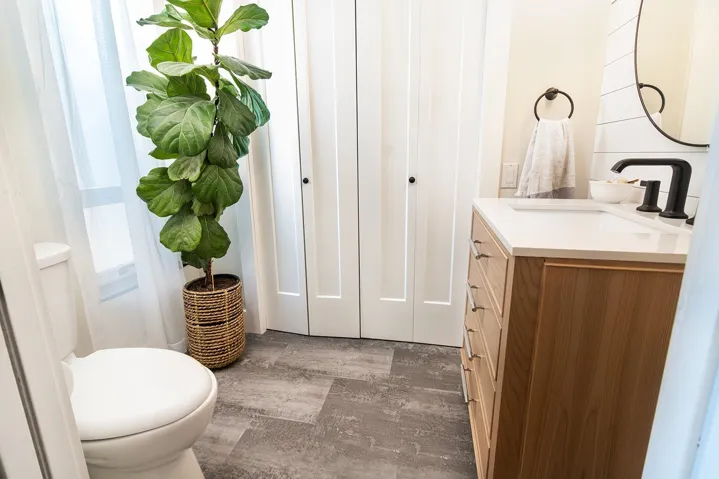 Bathroom with vanity and wood finished floors