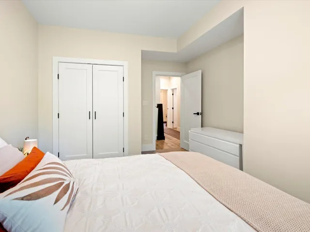 Bedroom featuring a closet and wood finished floors