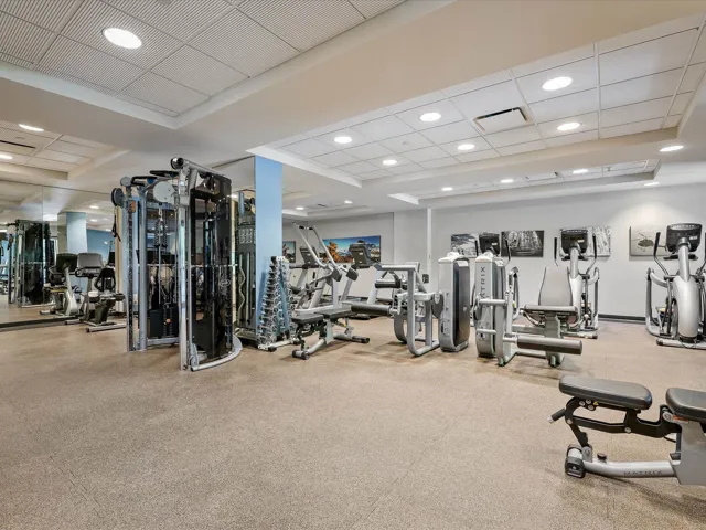 Exercise room featuring recessed lighting