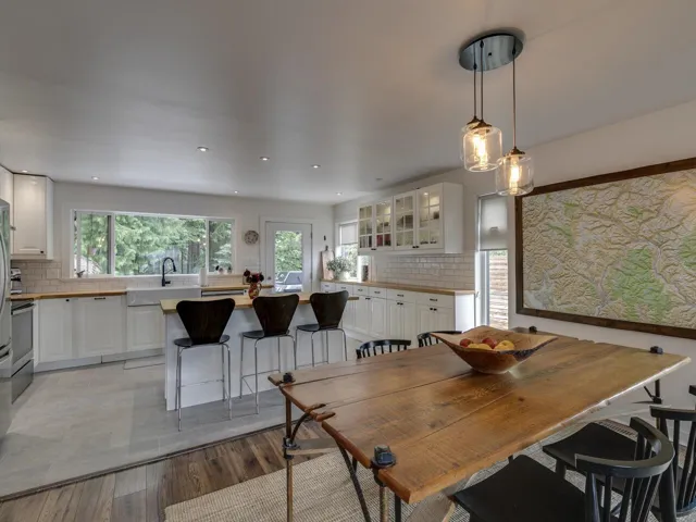 Dining space featuring light wood-type flooring and recessed lighting