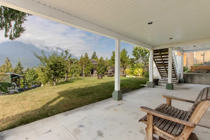View of patio featuring stairway