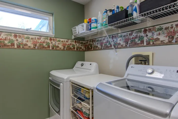 Laundry room with separate washer and dryer